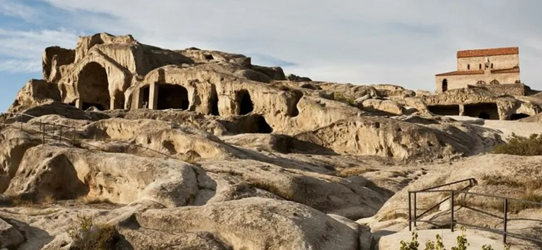 Uplistsikhe cave city carved in sandstone rock near Gori — day trip from Tbilisi