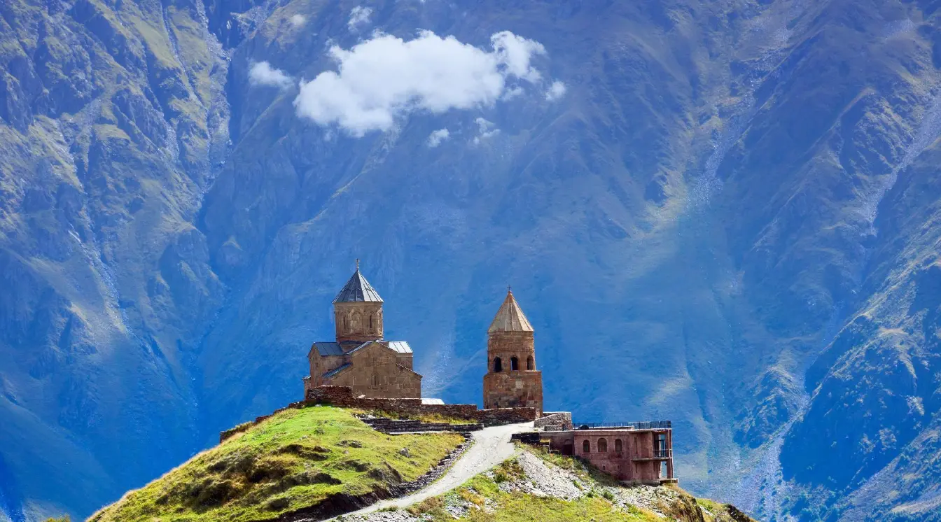 Gergeti Trinity Church with Mount Kazbek 5054m — Georgian Military Highway day trip from Tbilisi