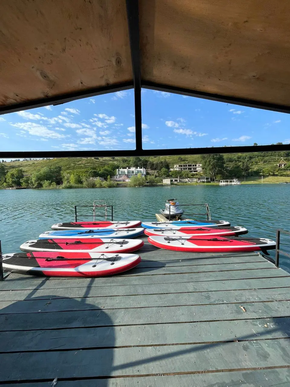 SUP Rent station at Tbilisi Sea — pontoon and loungers